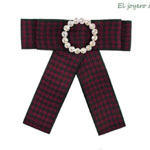 Broche de tela y pedrería