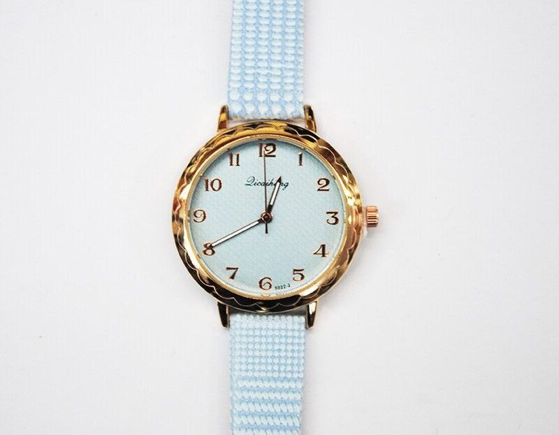 Reloj correa azul cuadros