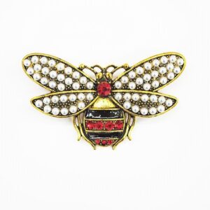 Broche avispa perlas
