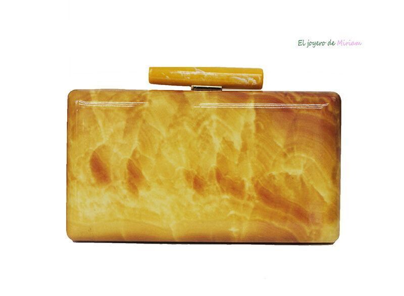 Bolso clutch símil mármol