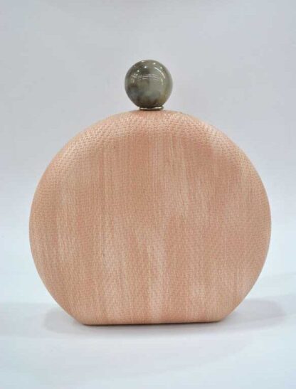 Bolso clutch redondo rosa