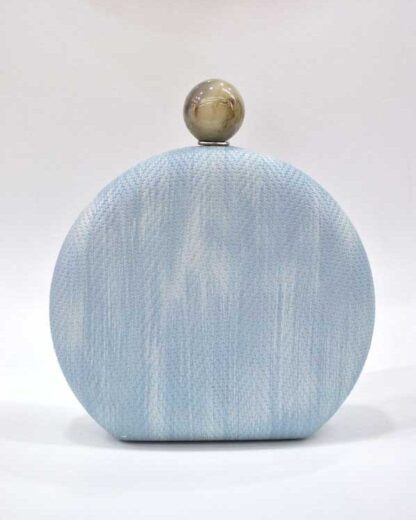 Bolso clutch redondo azul