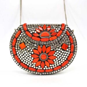Bolso clutch naranja y plateado