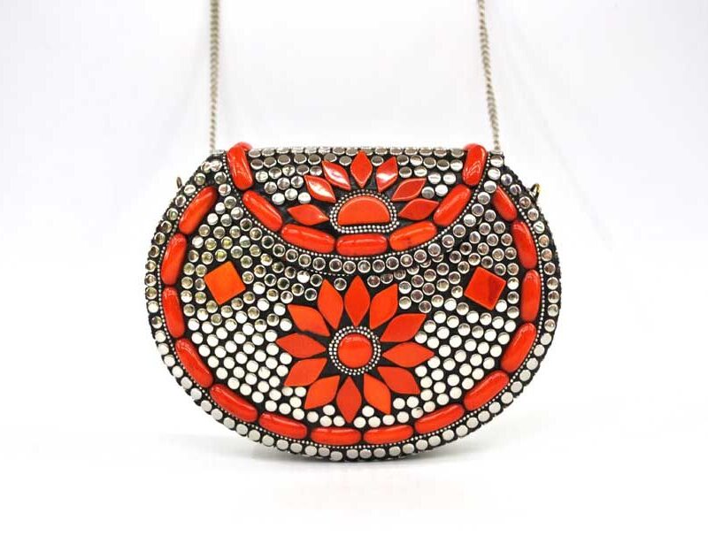 Bolso clutch naranja y plateado