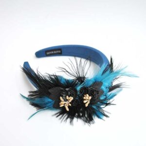 Diadema plumas petróleo