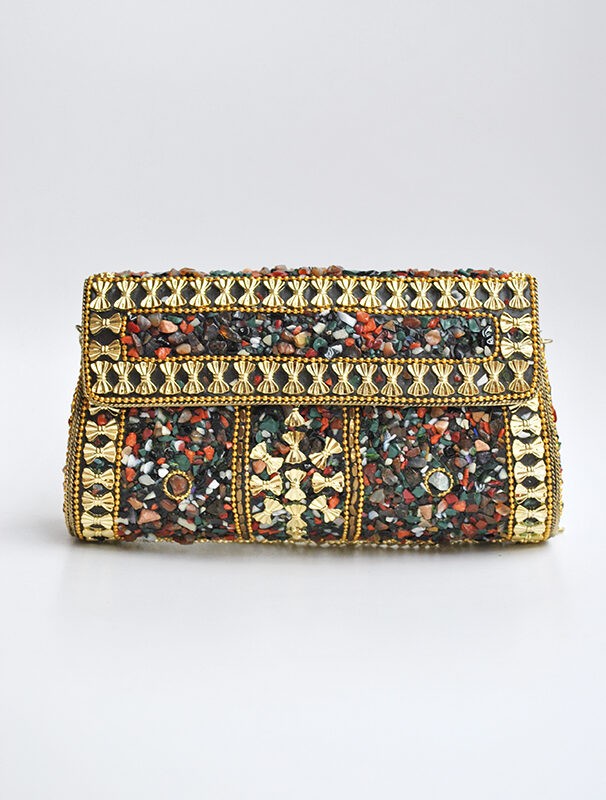 Bolso clutch dorado piedras