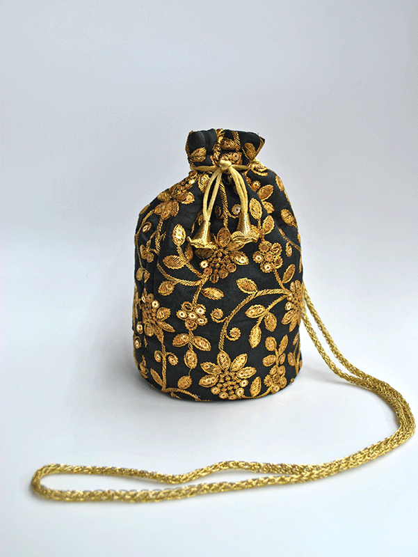 Bombonera negra y dorada