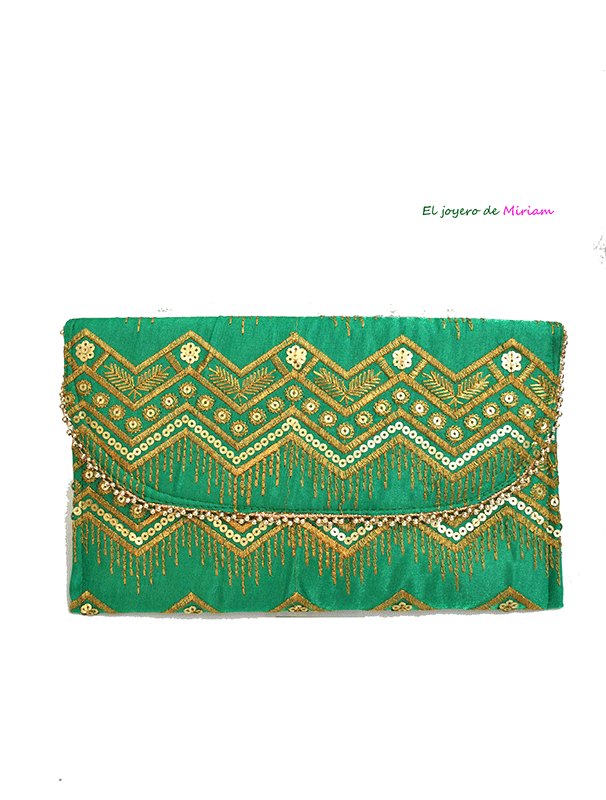 Cartera sobre verde y oro