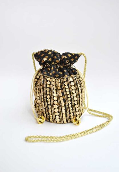 Bombonera negra y oro