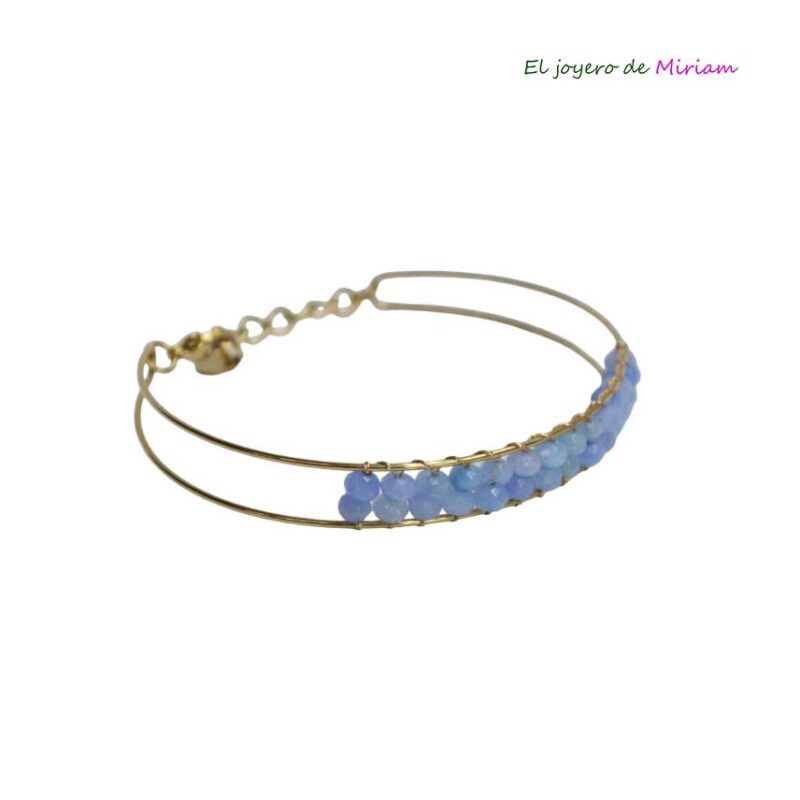 Pulsera dorada y azul celeste