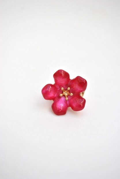 Anillo elástico fucsia flor