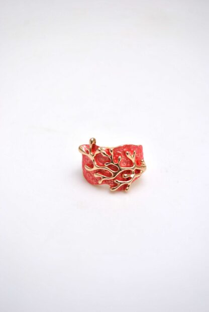 Anillo elástico coral y oro