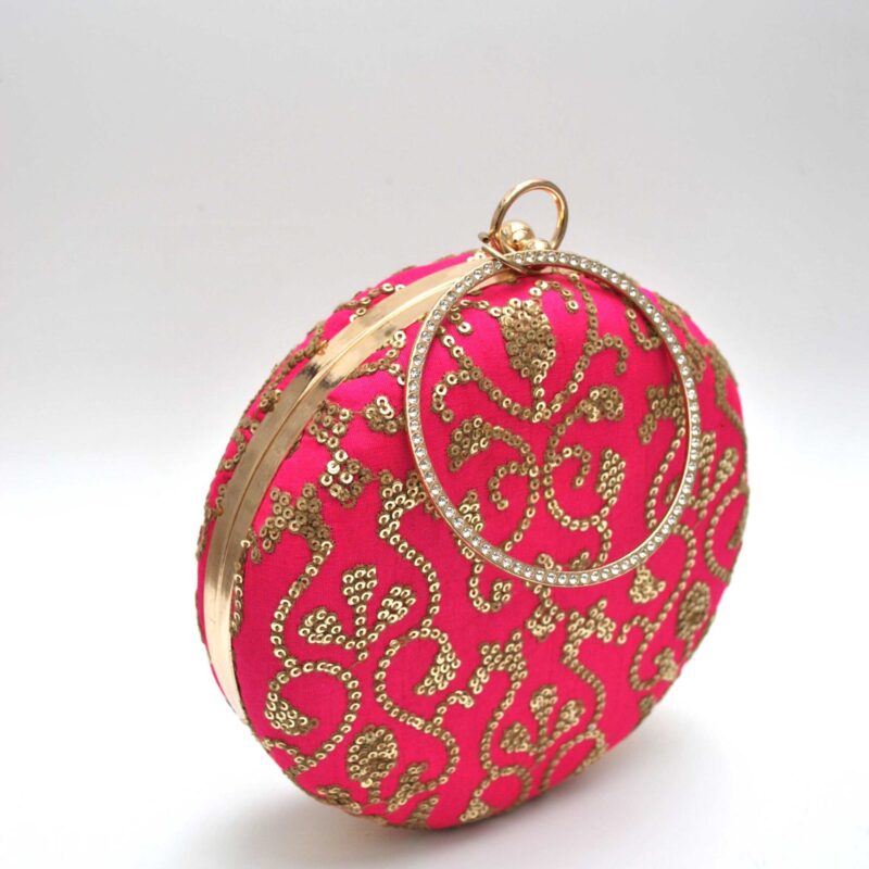 Clutch redondo fucsia