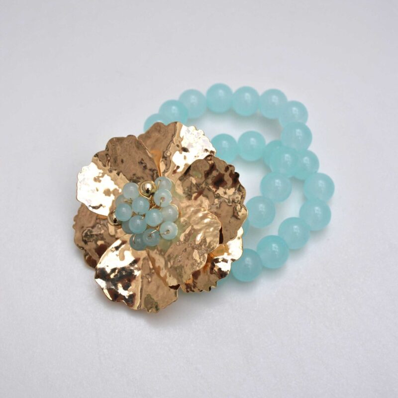 Brazalete azul flor dorada