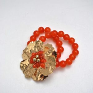 Brazalete naranja flor dorada