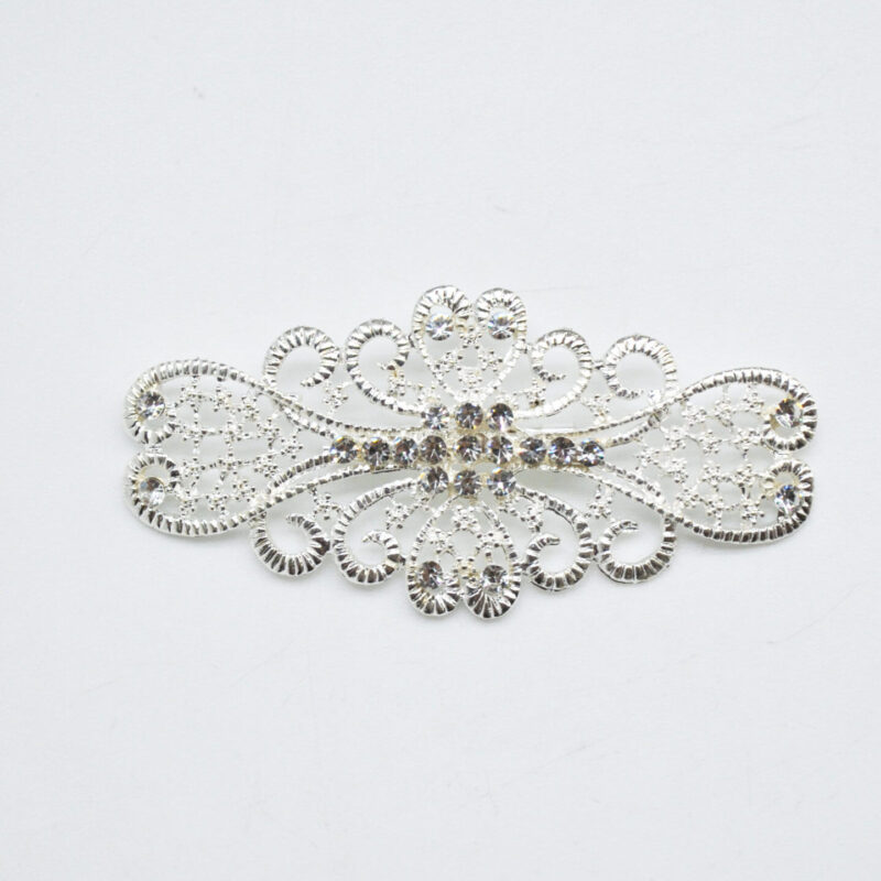 Broche o pasador plateado mantilla