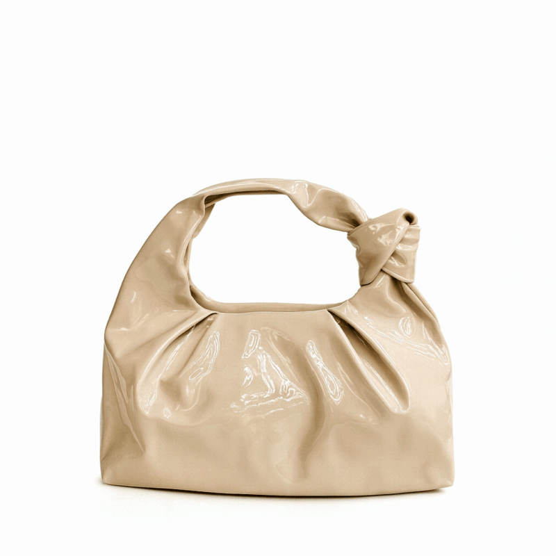 Bolsito clutch charol beige