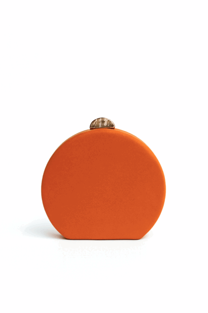 Bolso clutch redondo naranja