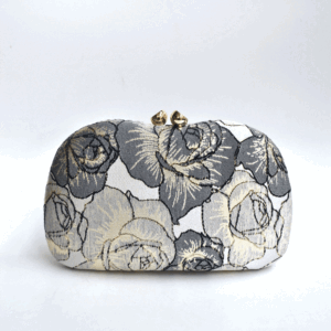 Bolso clutch marino bordados