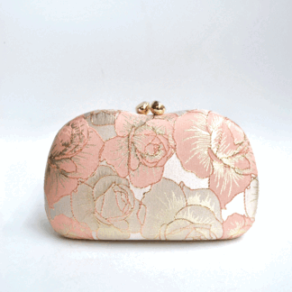 Clutch rosa y oro bordados