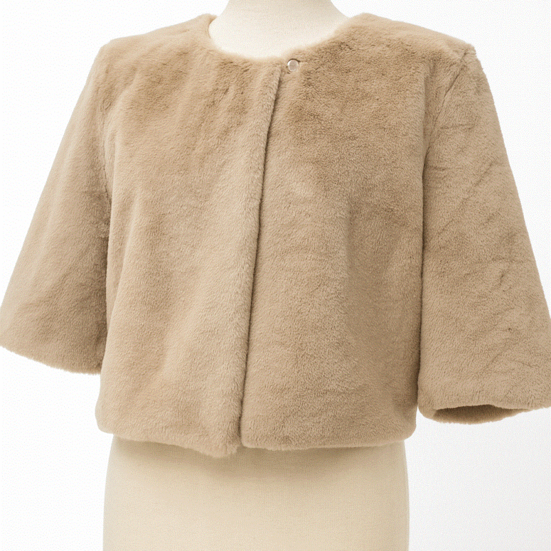 Estola beige o abrigo pelo