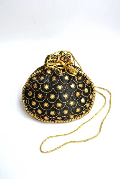 Bolso bombonera negra y oro