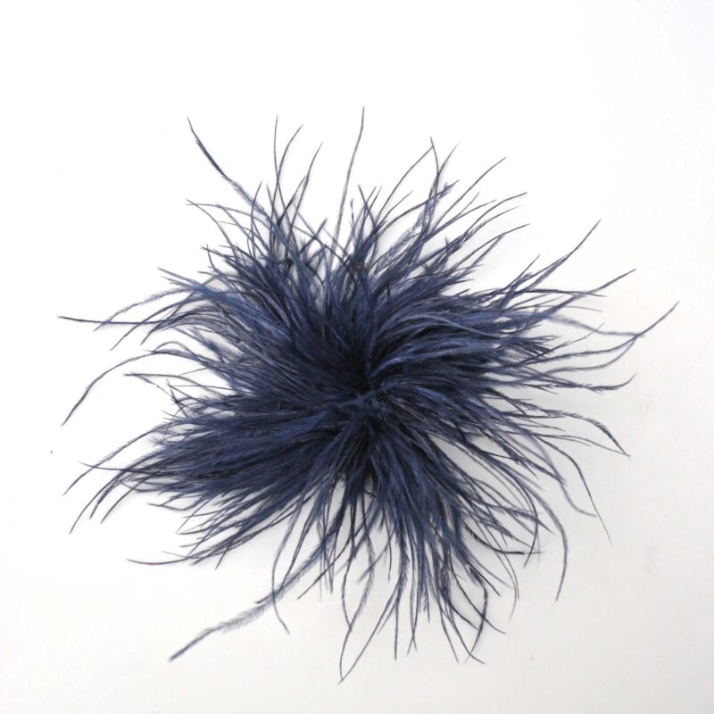 Tocado broche azul marino plumas