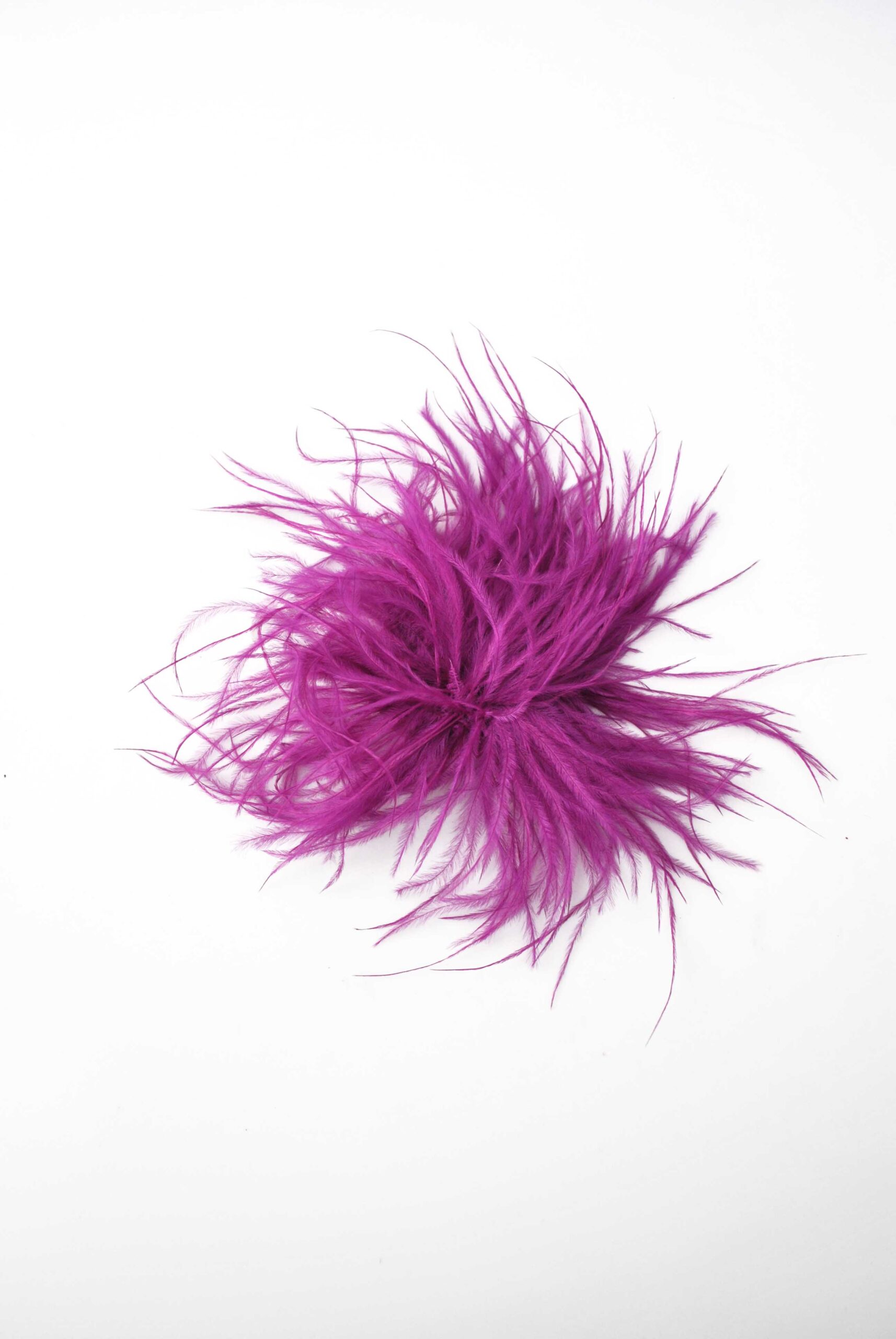 Tocado broche bugamvilla plumas