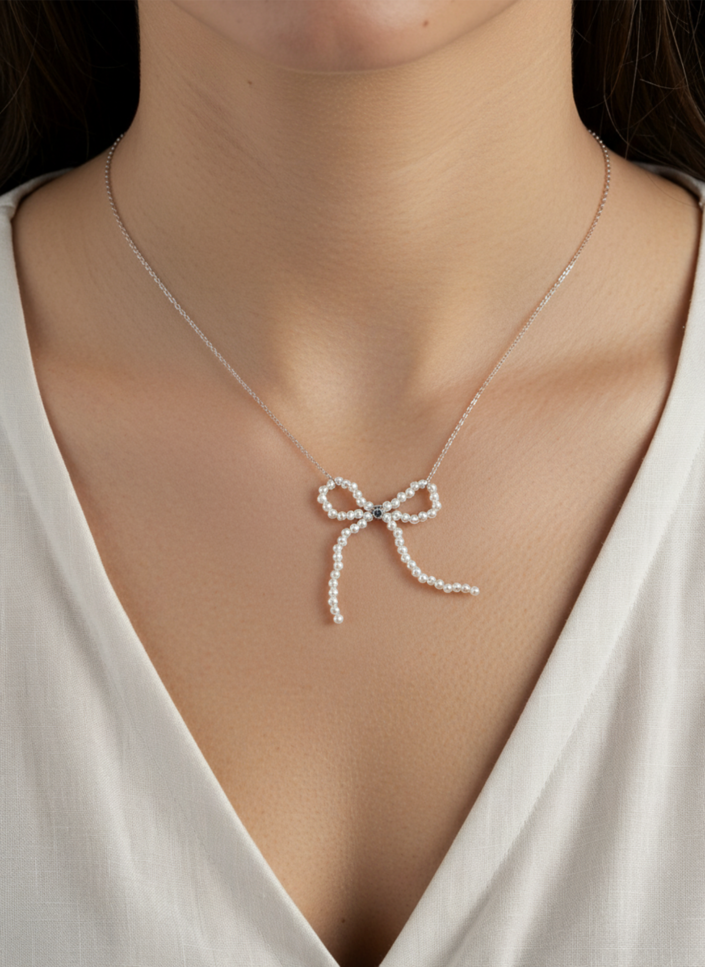 Colgante acero lazo perlas