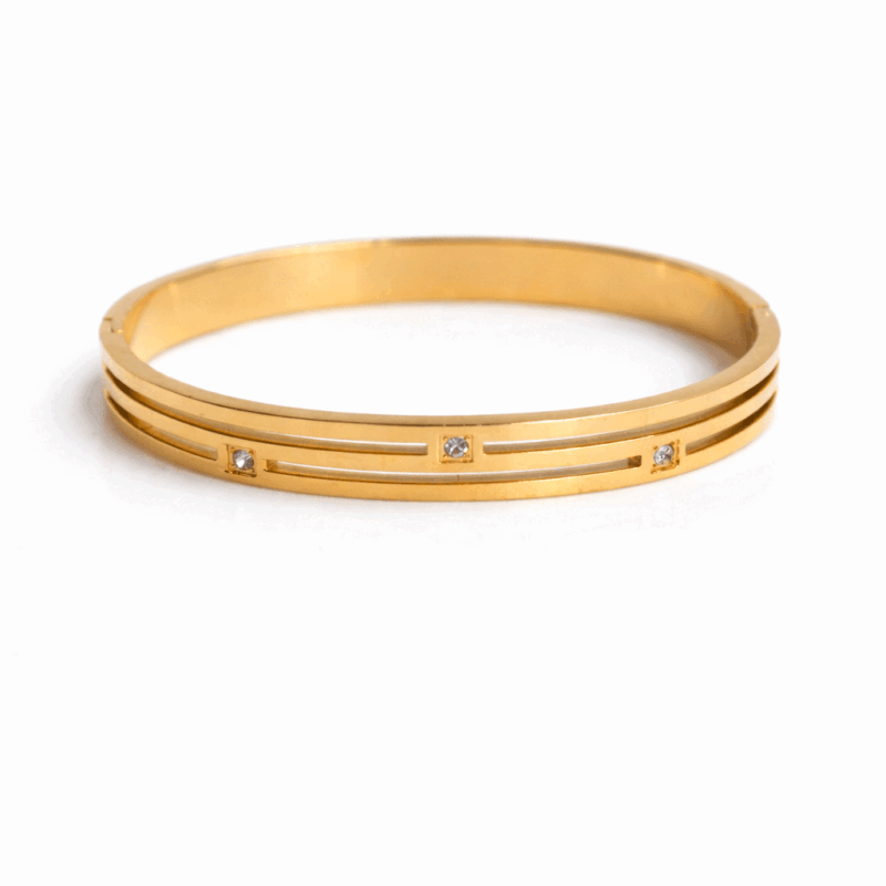 Pulsera rígida dorada acero