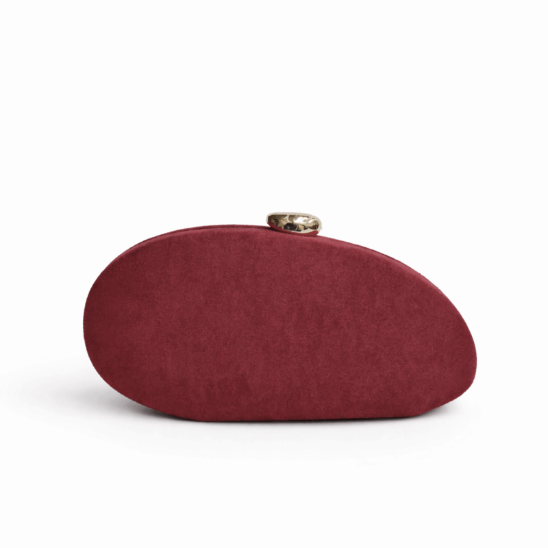 Bolso clutch irregular burdeos