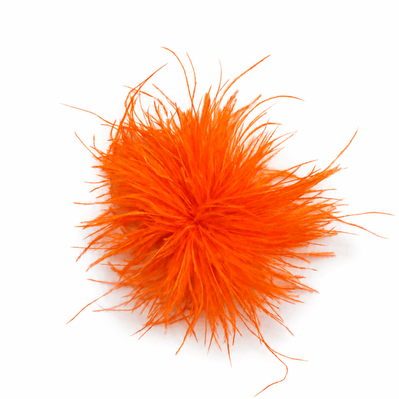Tocado broche naranja plumas