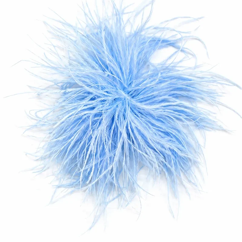 Tocado broche azul celeste plumas