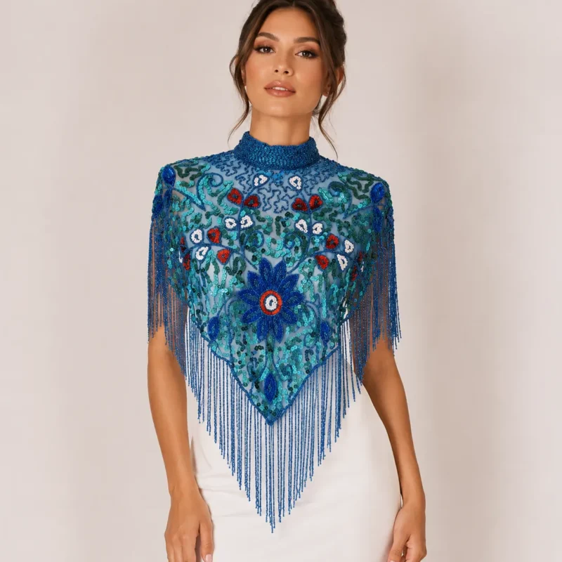 Capa joya pedrería azul bordada
