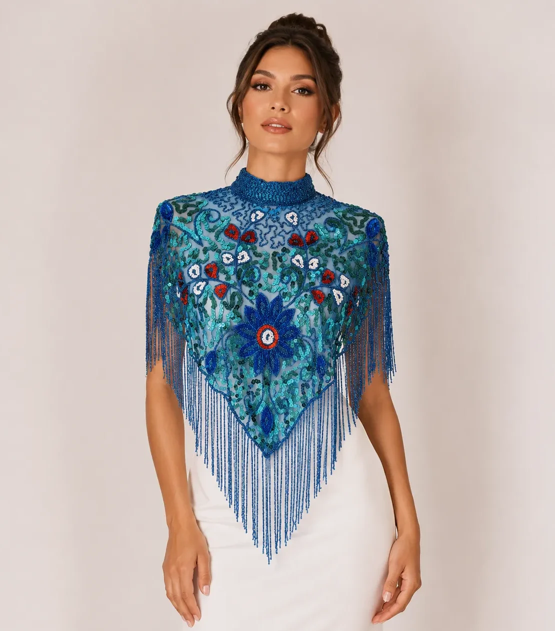 Capa joya pedrería azul bordada