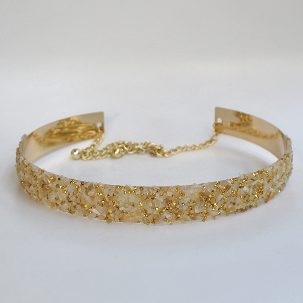 Cinturón rígido dorado