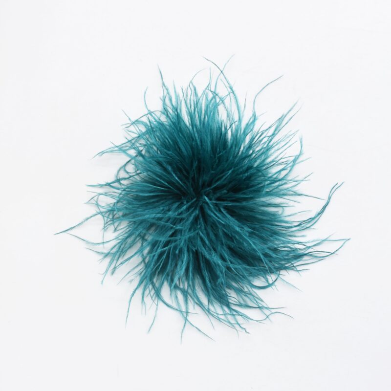 Tocado broche azul petróleo plumas