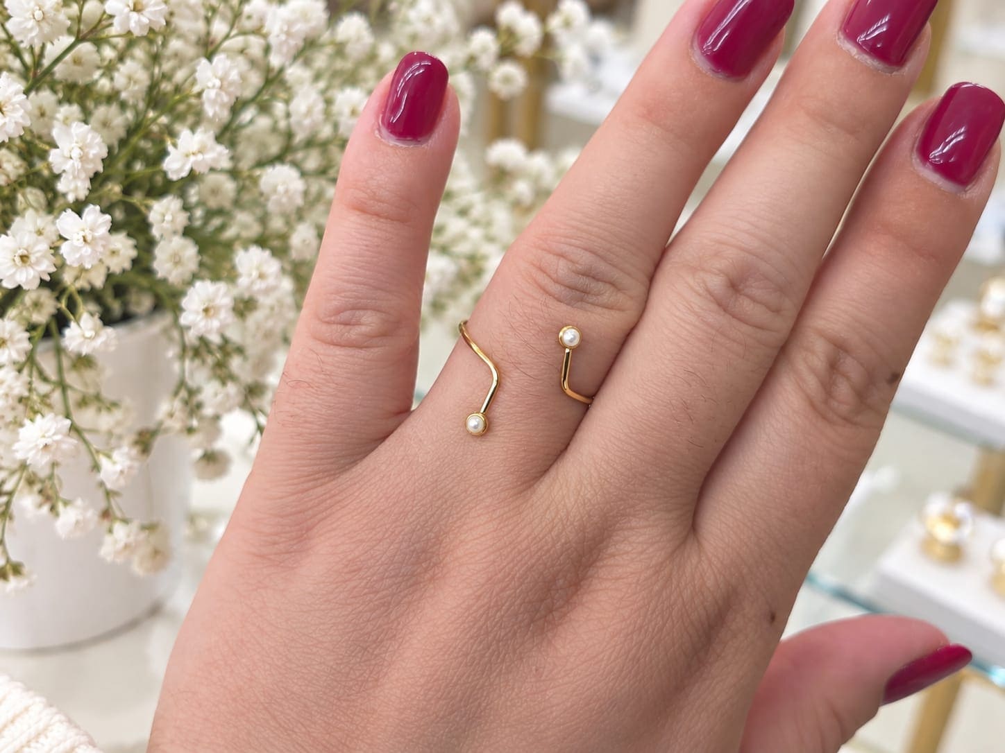 Anillo acero dorado fino perlas
