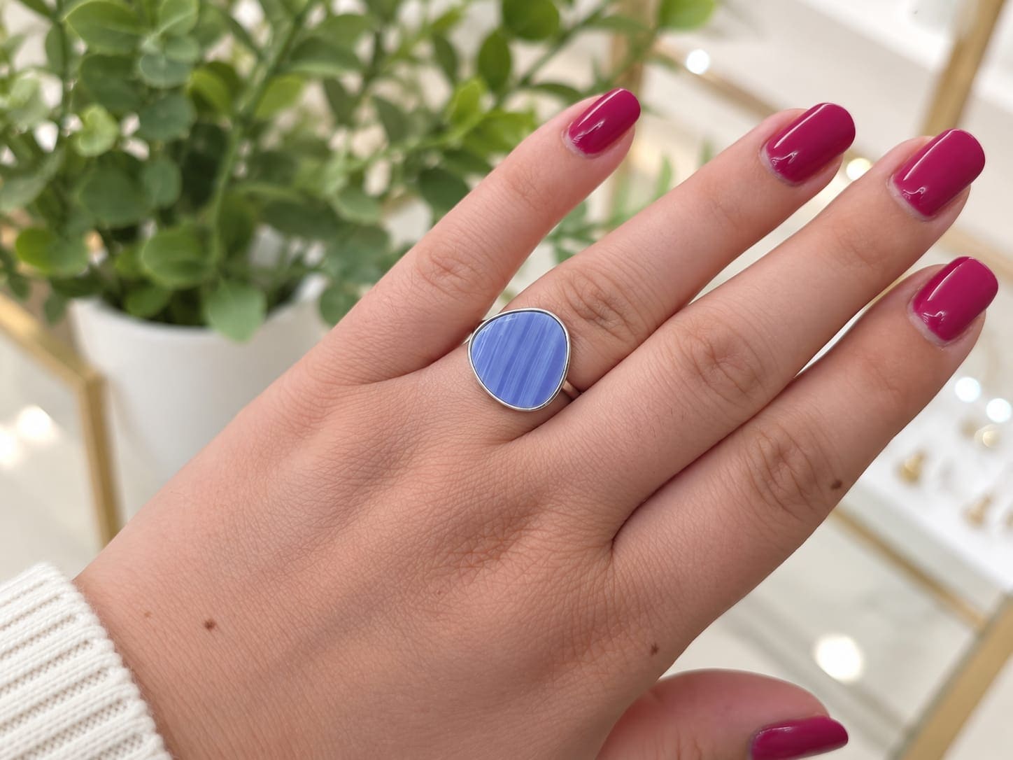 Anillo acero plateado piedra resina azul