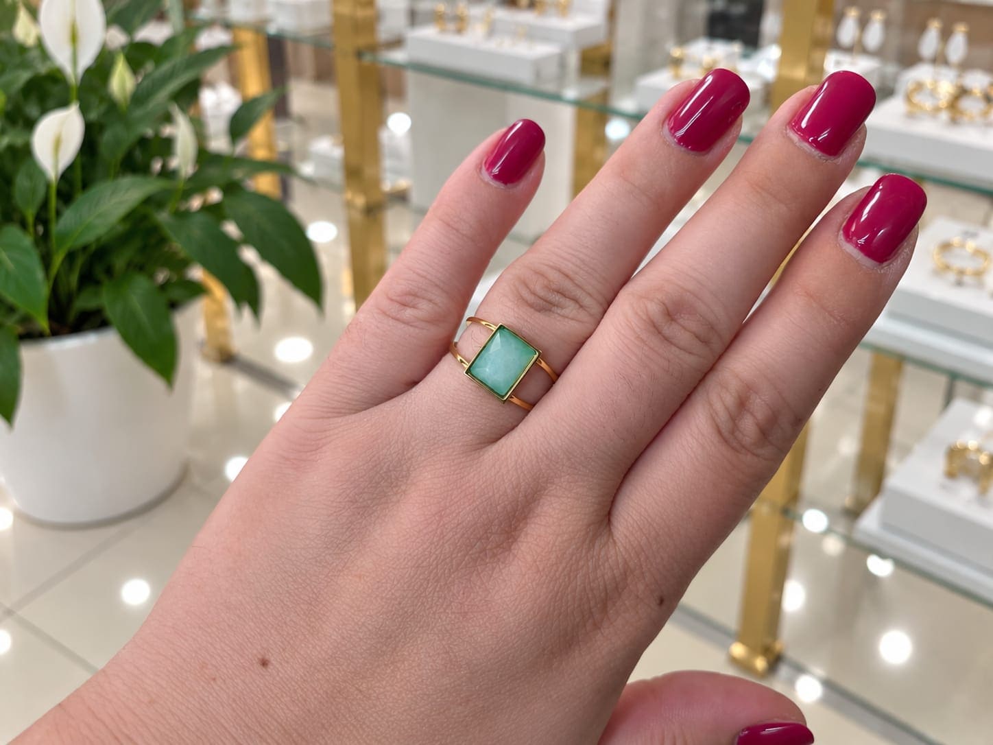 Anillo dorado acero piedra verde agua